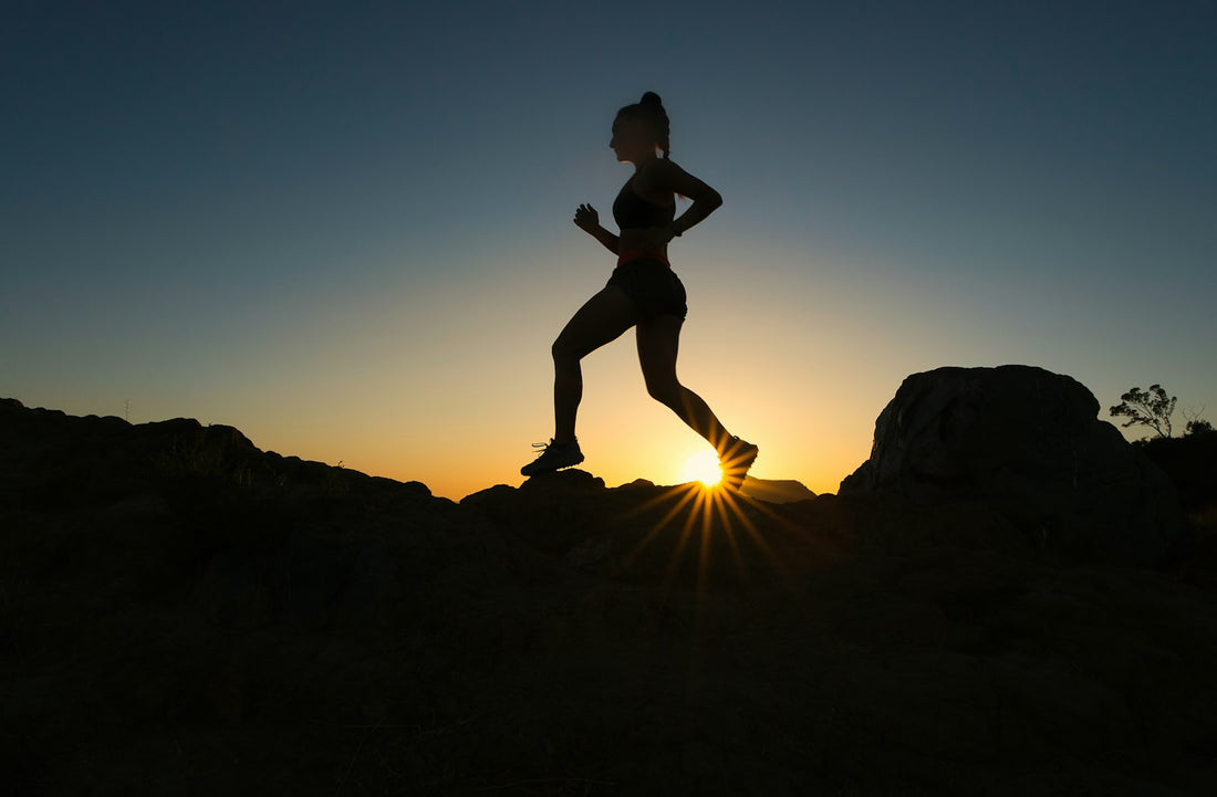 Runner outdoors at sunset