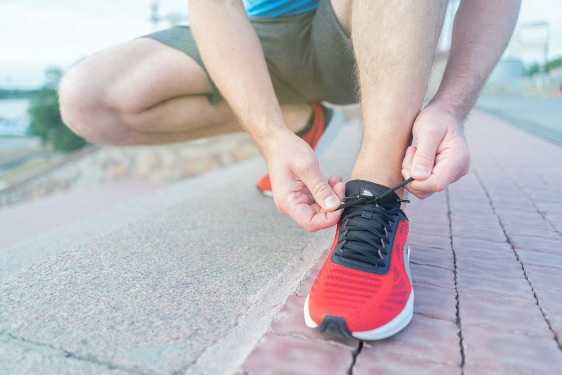 Person in trainers ready to start exercising