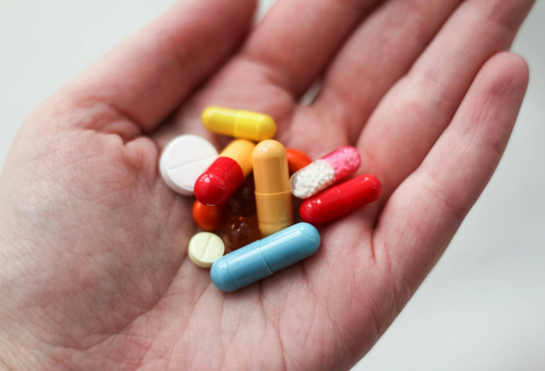 A pill resting in an open hand