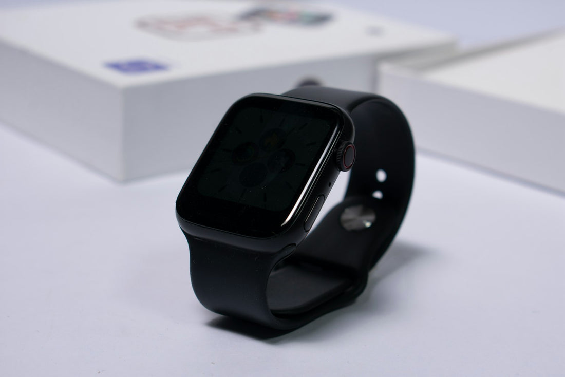 Black smartwatch on a white surface