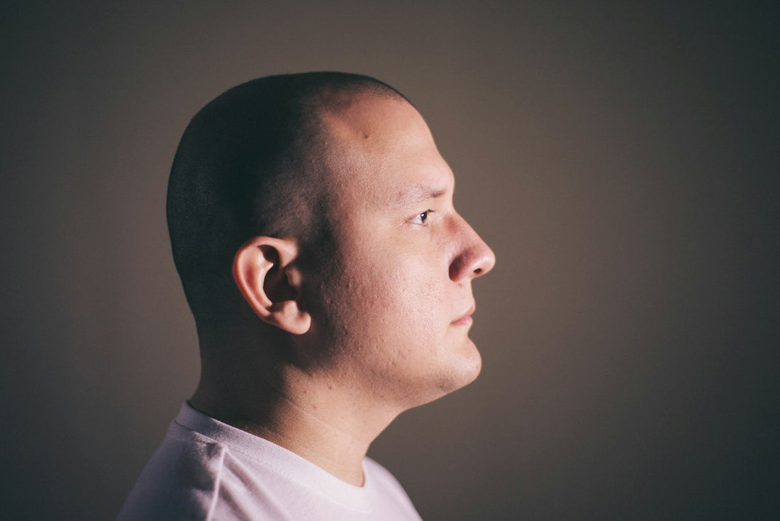 Close portrait of a man's face and jawline