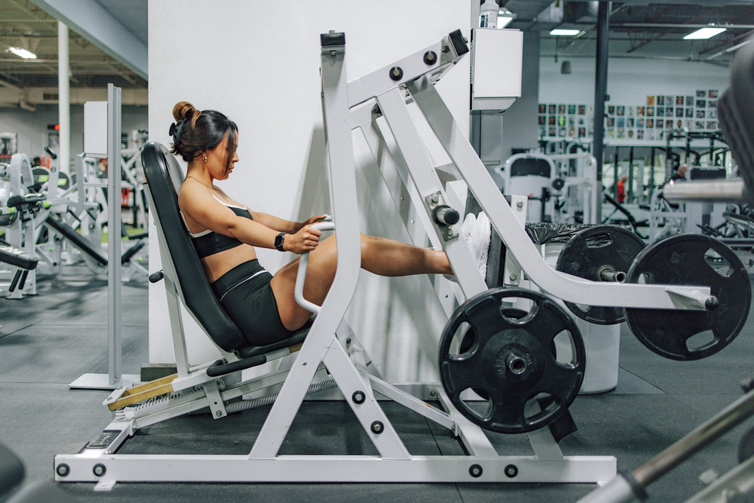 Seated leg exercise on a gym machine