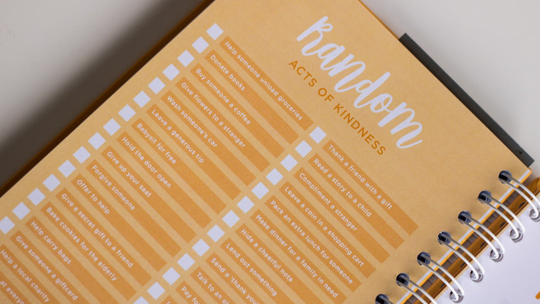 Notebook open to a handwritten weekly plan