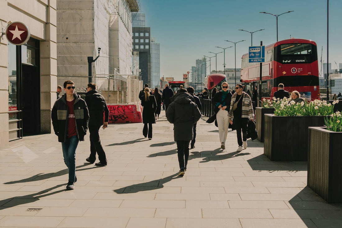 People walking on a sunny city street