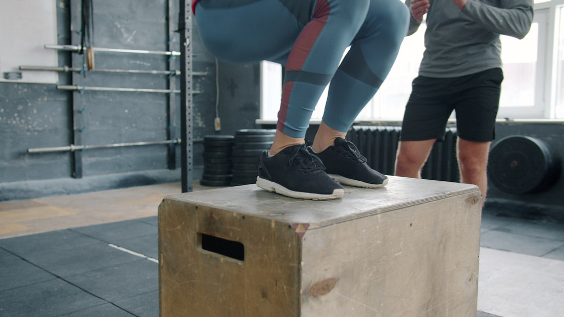 Box jump plyometric training in a gym