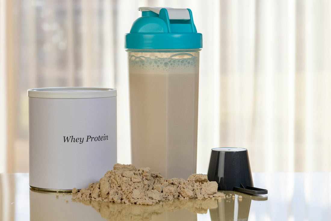 Whey protein powder with shaker and scoop